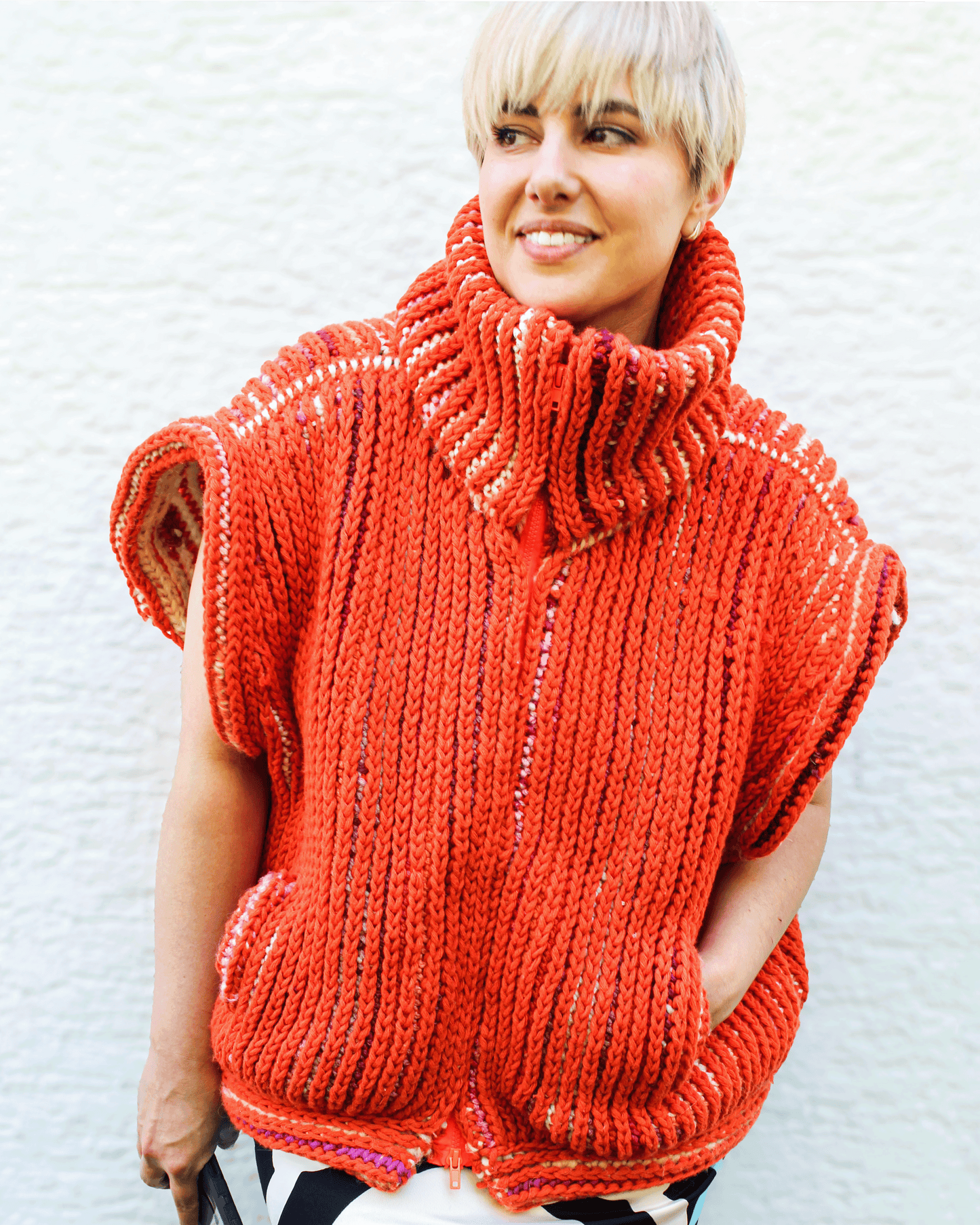 Brioche Crochet Vest — fully zipped front view in Sherbet colorway on size medium designer, oversized sleeveless silhouette with chunky stand-collar in two-color brioche stitch.