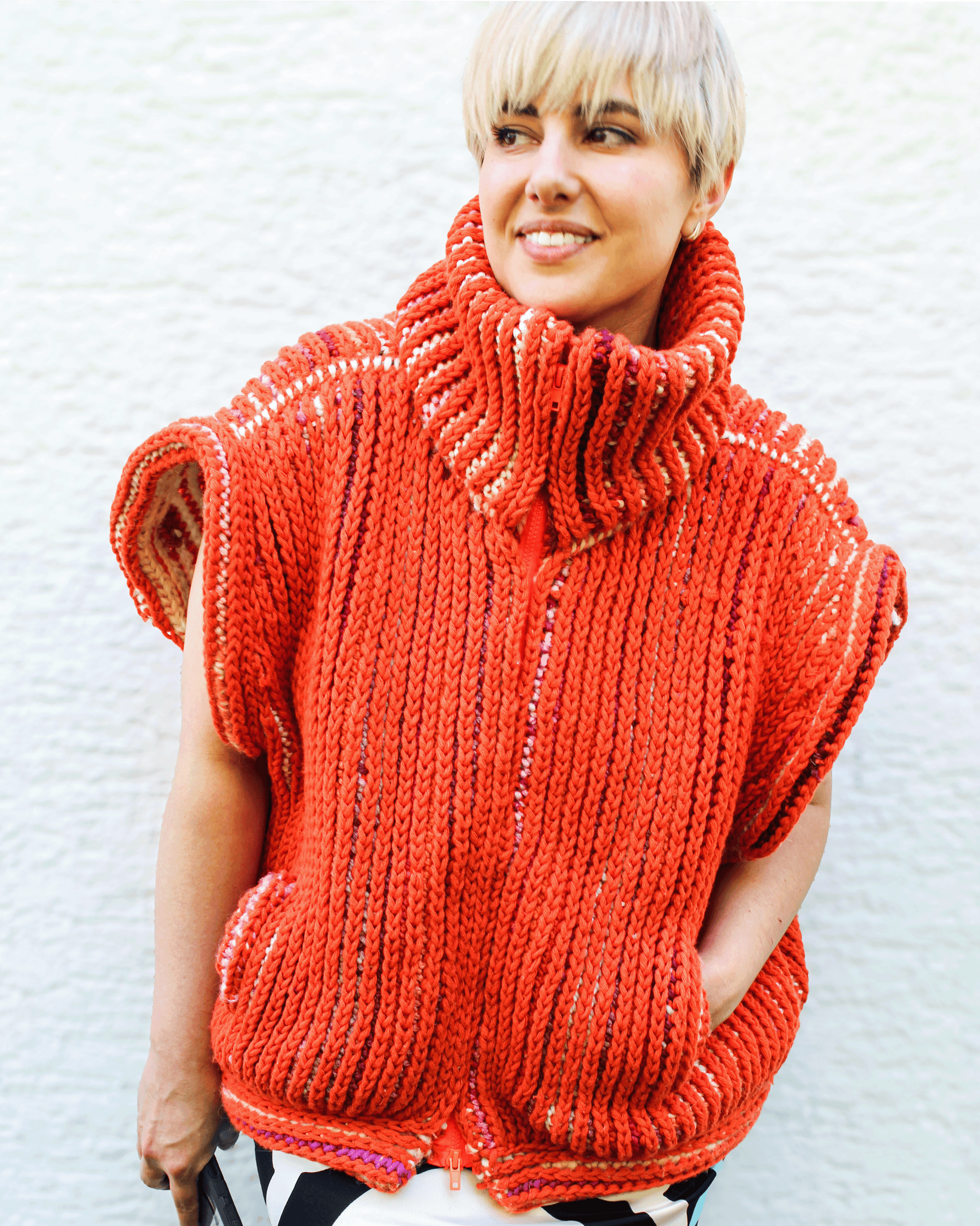 Brioche Crochet Vest — fully zipped front view in Sherbet colorway on size medium designer, oversized sleeveless silhouette with chunky stand-collar in two-color brioche stitch.