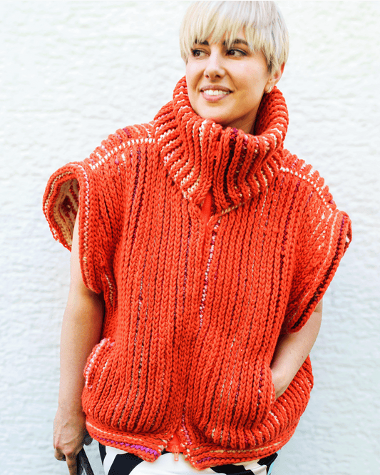 Brioche Crochet Vest — fully zipped front view in Sherbet colorway on size medium designer, oversized sleeveless silhouette with chunky stand-collar in two-color brioche stitch.