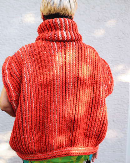 Brioche Crochet Vest — back view in Sherbet colorway on size medium designer, sun-catching two-color brioche stitch ribs across the back panel of the chunky sleeveless silhouette.