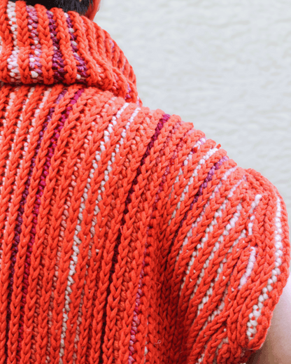 Brioche Crochet Vest — close-up of the seamed shoulder construction and vertical two-color brioche stitch ribs in Sherbet colorway, side-to-side modular panel detail.